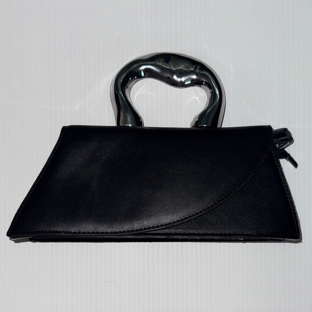 Elegant Black Handbag with Silver Handle